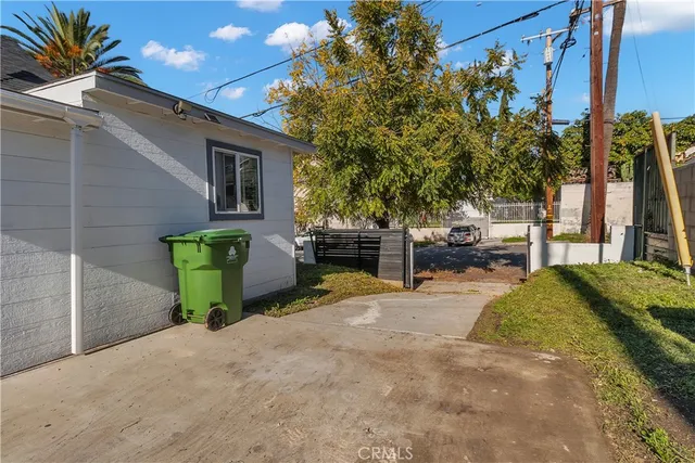 a view of a car in front of a house