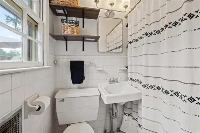 a bathroom with a sink and a toilet