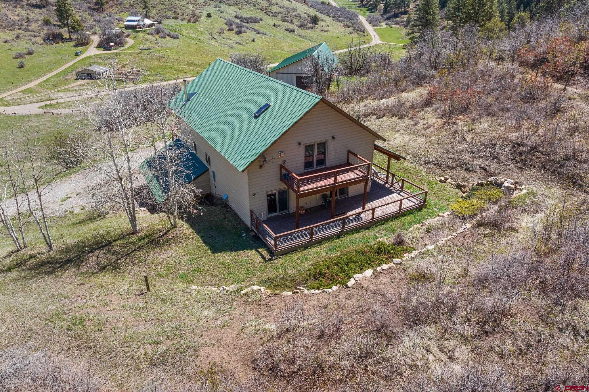 26 Severn Peak Road Bayfield, CO 81122 - Photo 1 of 36 an aerial view of a house with a yard