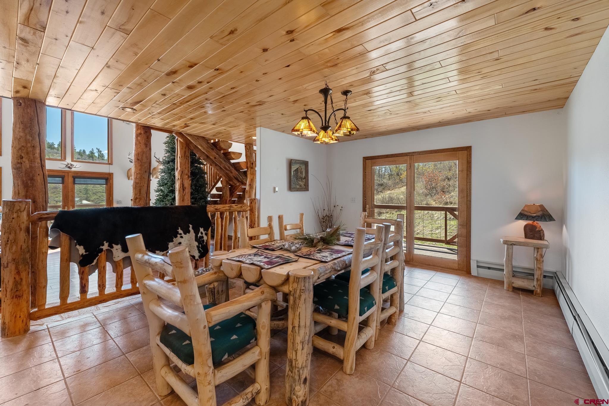 26 Severn Peak Road Bayfield, CO 81122 - Photo 15 of 36 a view of a dining room with furniture