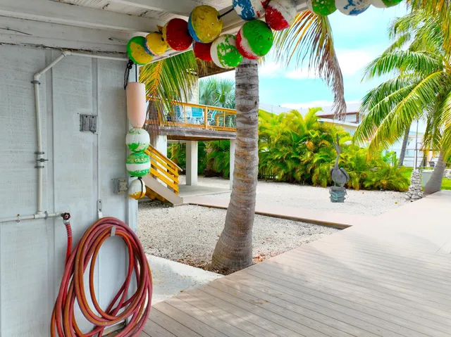 an aerial view of a house with a garden
