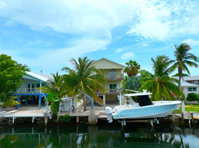 a view of a hallway with stairs