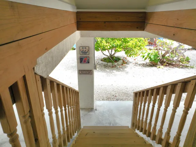 a view of swimming pool with a patio and a yard