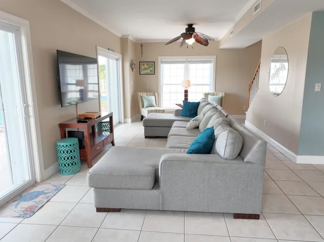 a living room with furniture and a window