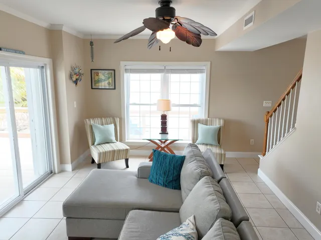 a living room with a couch and a window