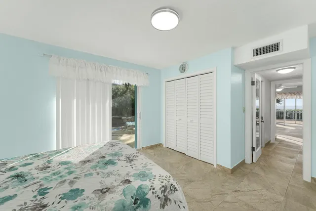 a view of a swimming pool with a yard