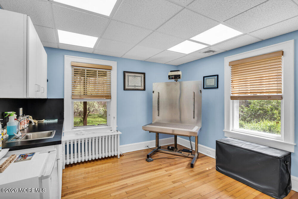 34 State Route Colts Neck, NJ 07722 - Photo 29 of 40 a workspace with wooden floor and a window