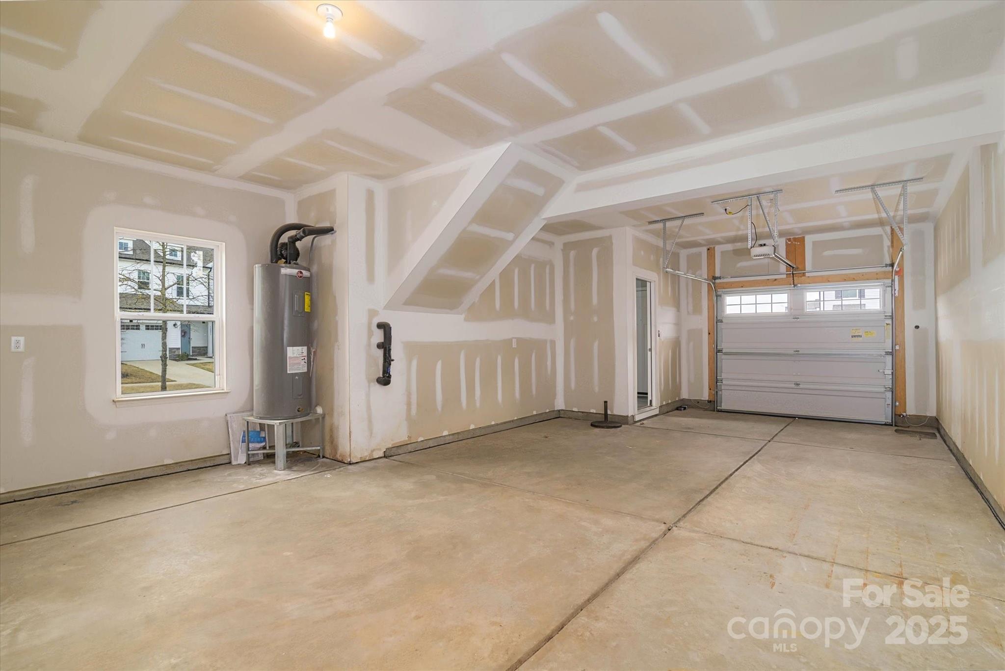 13304 Porter Creek Road Charlotte, NC 28262 - Photo 21 of 22 an empty room with windows