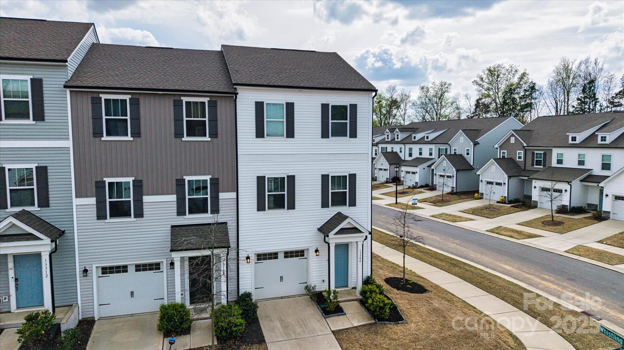 13304 Porter Creek Road Charlotte, NC 28262 - Photo 5 of 22 a front view of a house with parking space