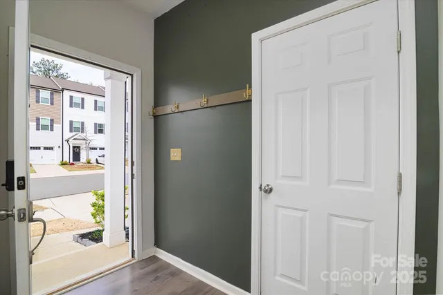 a view of a livingroom with wooden floor