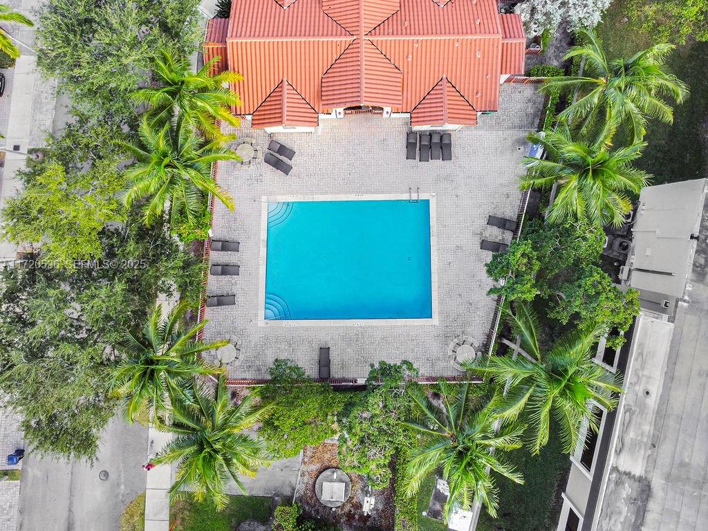 1007 Northeast 208th Street, Unit 1007 Miami, FL 33179 - Photo 30 of 68 a picture of a small yard