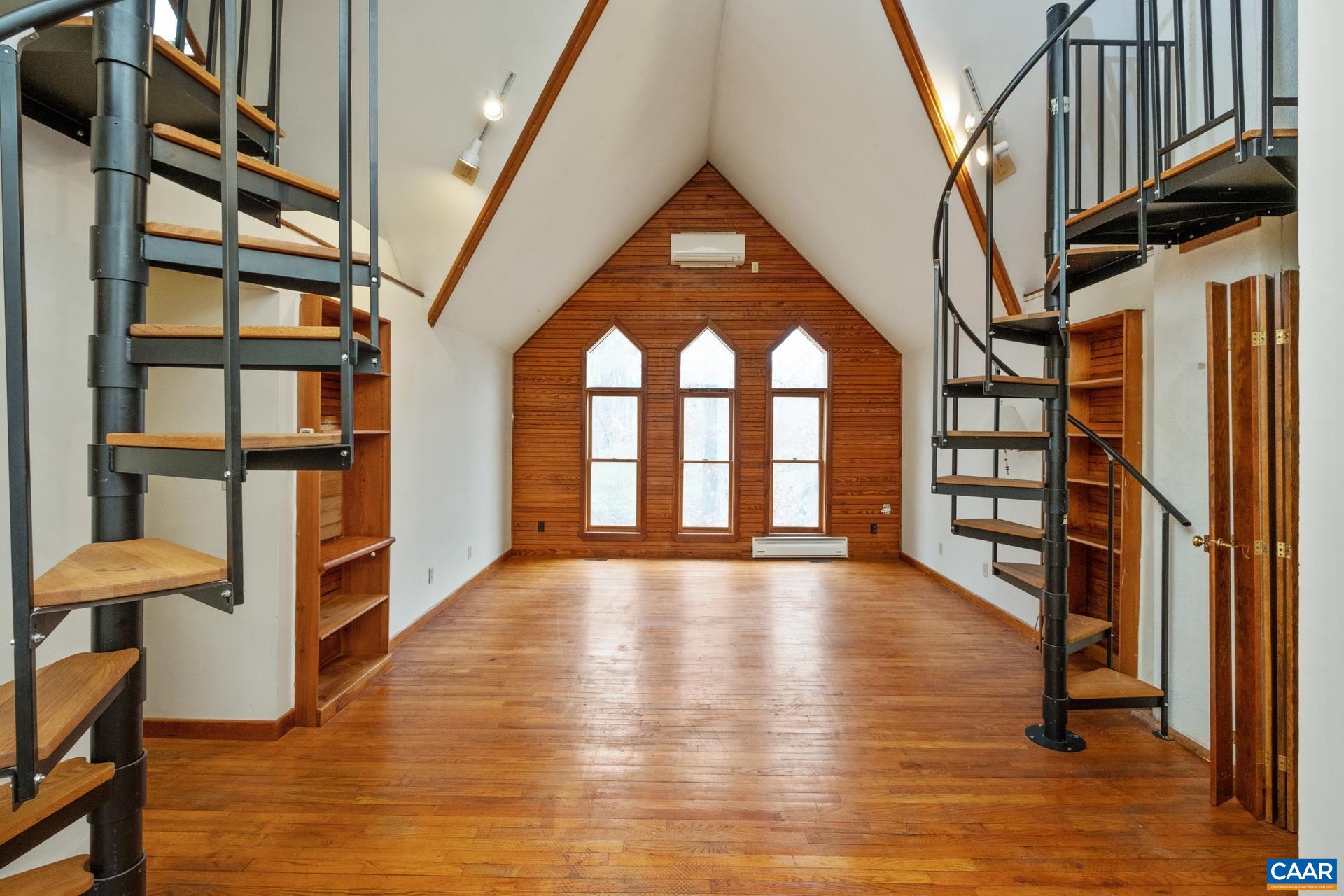 122 Seville Road Rochelle, VA 22738 - Photo 18 of 40 a view of an entryway with wooden floor and door