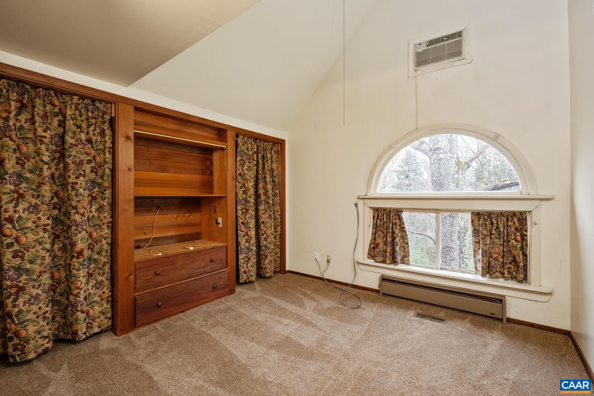 122 Seville Road Rochelle, VA 22738 - Photo 24 of 40 an empty room with windows and closet
