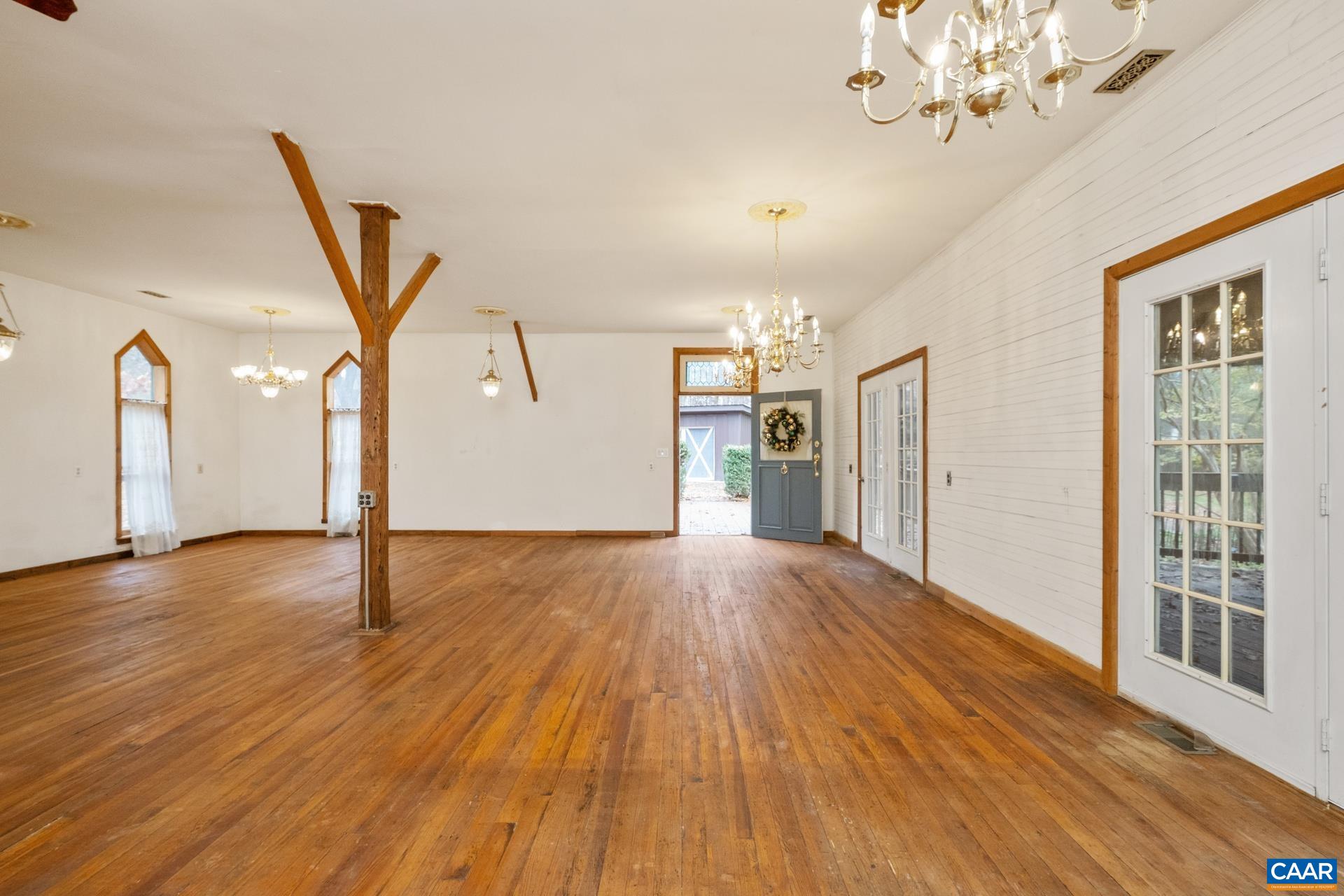 122 Seville Road Rochelle, VA 22738 - Photo 6 of 40 a view of an empty room with wooden floor