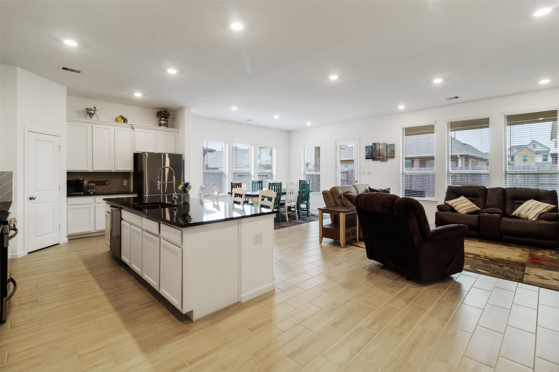 3623 Rock Ledge Drive Rosenberg, TX 77469 - Photo 16 of 31 a large white kitchen with lots of counter top space