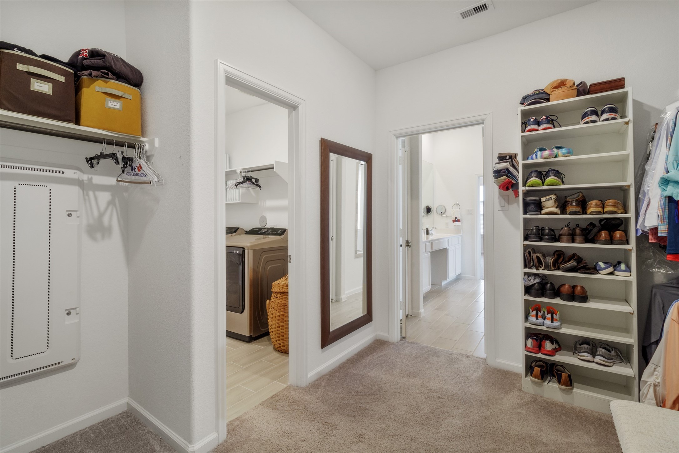 3623 Rock Ledge Drive Rosenberg, TX 77469 - Photo 29 of 31 a view of walk in closet with clothes and shoes