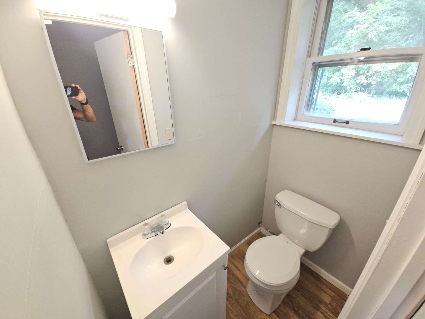 827 Balmoral Drive East Dundee, IL 60118 - Photo 14 of 16 a white toilet sitting next to a bathroom sink