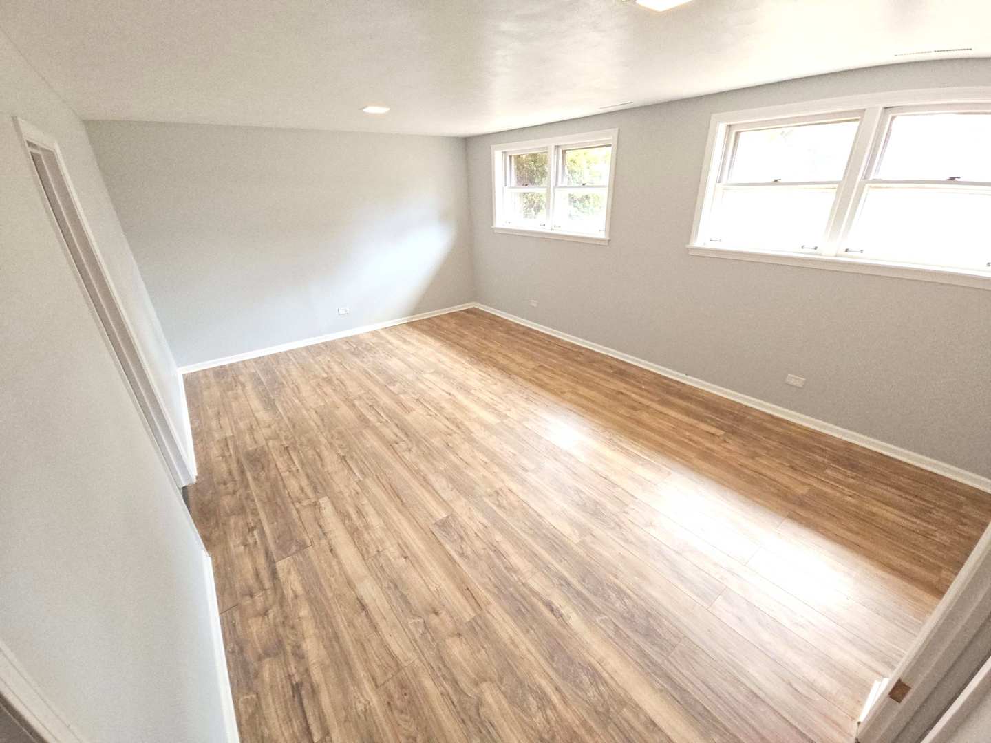 827 Balmoral Drive East Dundee, IL 60118 - Photo 3 of 16 a view of empty room with wooden floor and fan