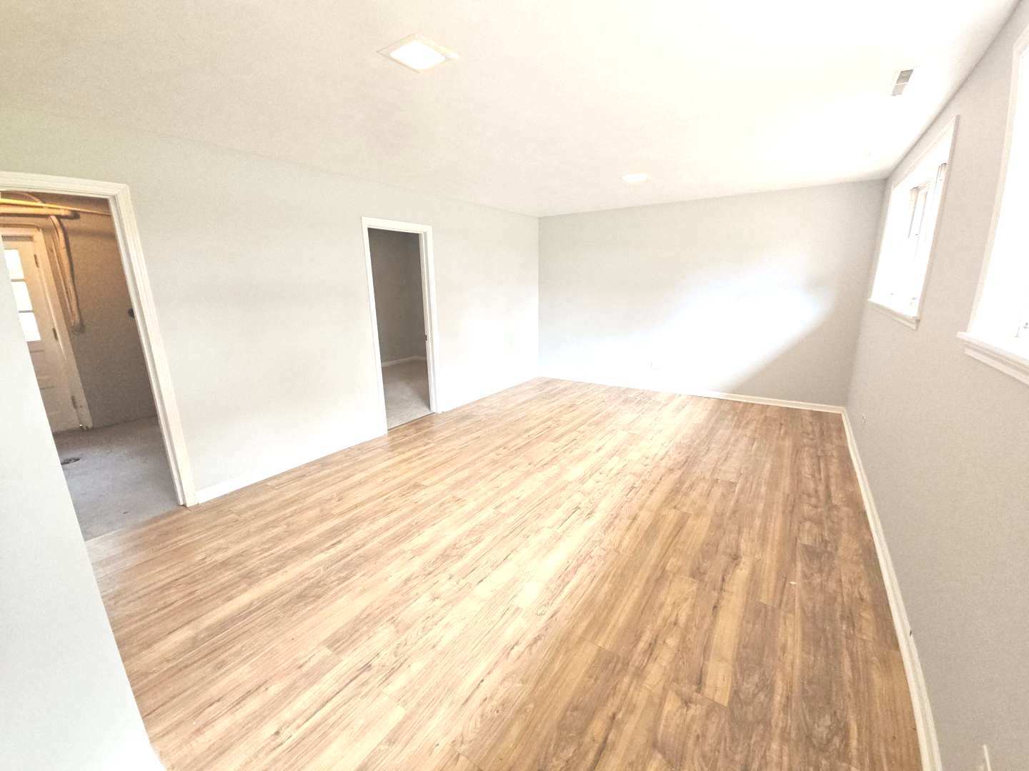 827 Balmoral Drive East Dundee, IL 60118 - Photo 7 of 16 a view of a room with wooden floor and a ceiling fan