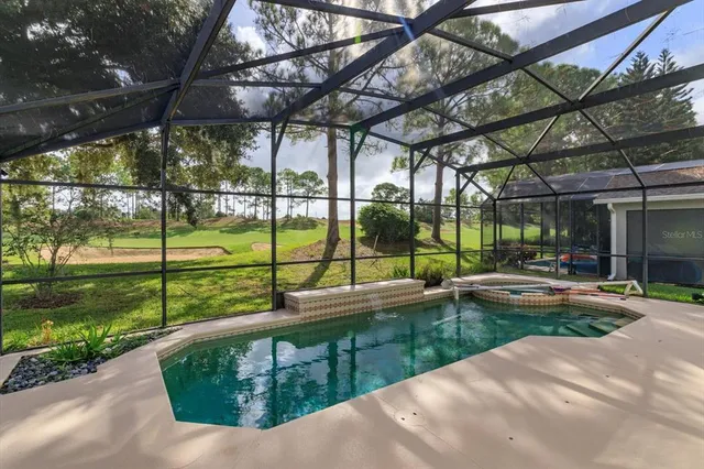 a view of a house with backyard from a patio