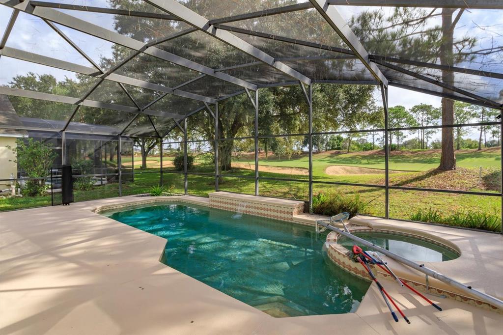 2833 Kokomo Loop Haines City, FL 33844 - Photo 27 of 30 a view of a backyard with swimming pool
