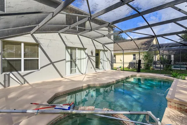 a view of yard with a table and chairs