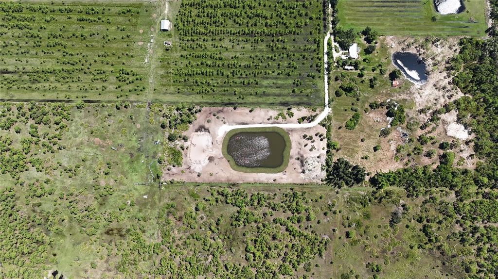 6455 Stringfellow Road St. James City, FL 33956 - Photo 21 of 33 a bathroom with a toilet and a sink