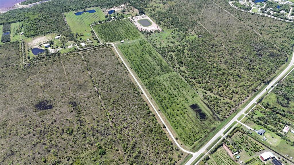 6455 Stringfellow Road St. James City, FL 33956 - Photo 23 of 33 a view of a yard