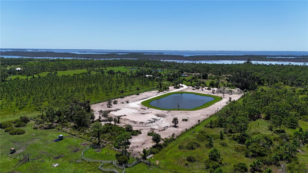6455 Stringfellow Road St. James City, FL 33956 - Photo 5 of 33 a view of a swimming pool with a yard