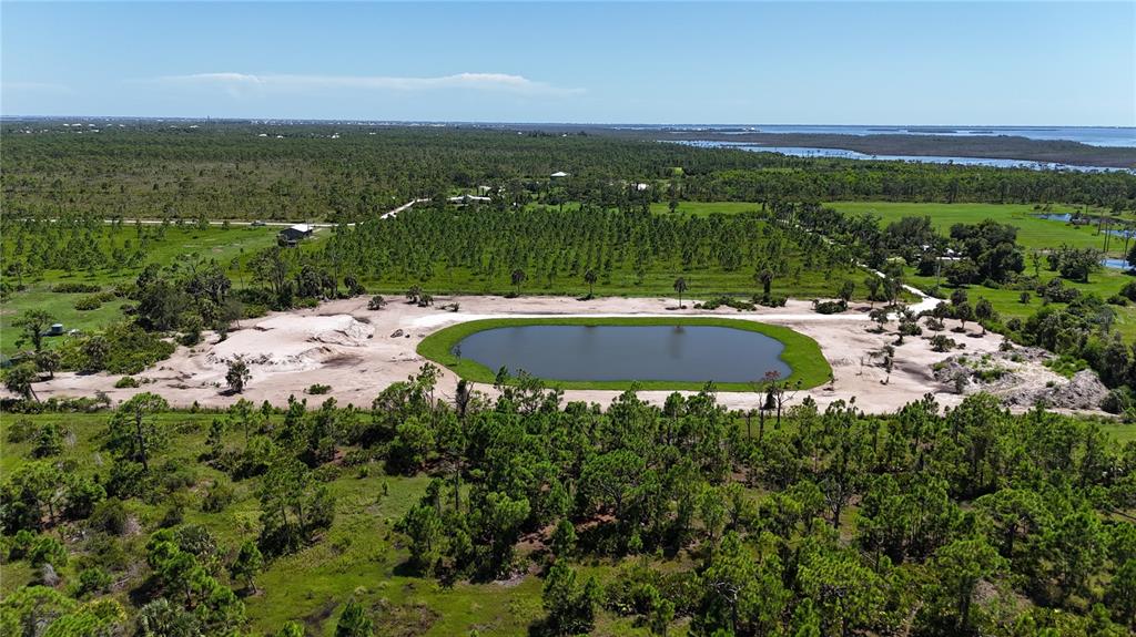 6455 Stringfellow Road St. James City, FL 33956 - Photo 7 of 33 a view of a terrace with yard and outdoor seating