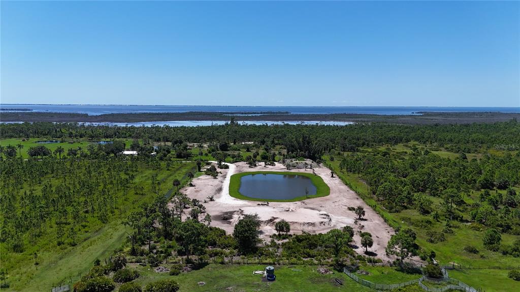 6455 Stringfellow Road St. James City, FL 33956 - Photo 8 of 33 a aerial view of a house