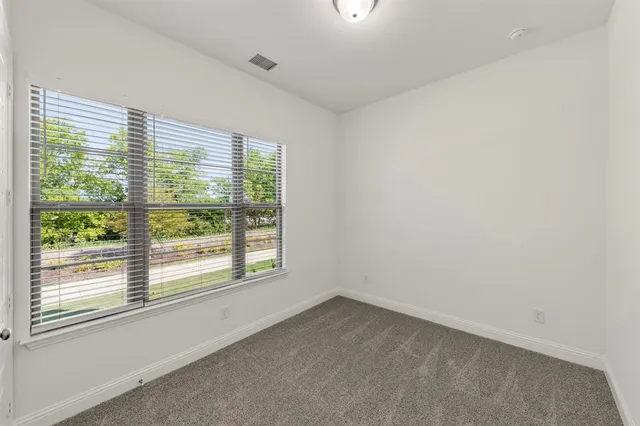 a kitchen with stainless steel appliances a sink stove and refrigerator