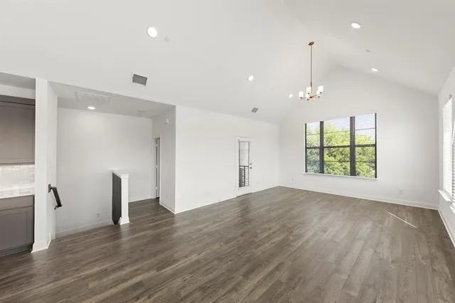 a kitchen with stainless steel appliances a sink stove and refrigerator