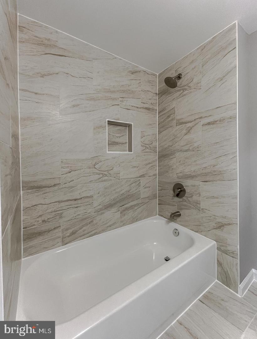 1016 Hill Road Landover, MD 20785 - Photo 6 of 8 Modern bath retreat with elegant tile work.