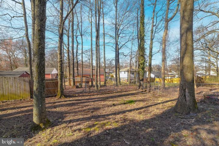 1016 Hill Road Landover, MD 20785 - Photo 8 of 8 Serene wooded retreat in a vibrant neighborhood.