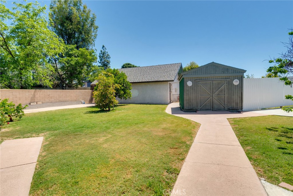 9130 Duncan Avenue Riverside, CA 92503 - Photo 29 of 34 a front view of a house with garden