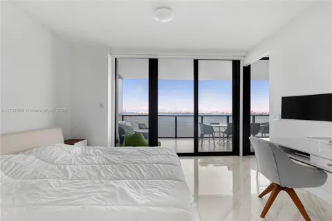 a view of a lake with a city