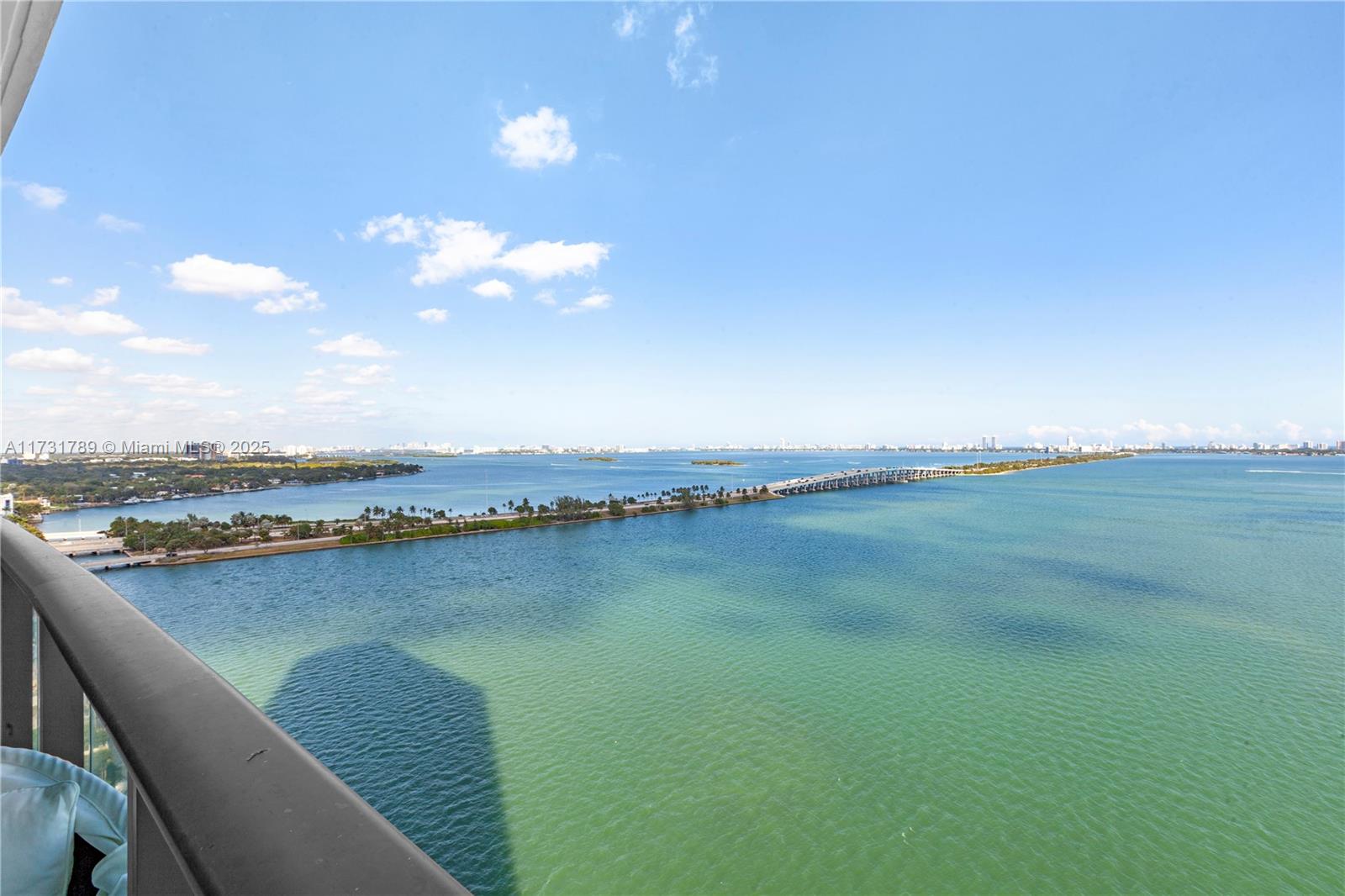 3131 Northeast 7th Avenue, Unit 1902 Miami, FL 33137 - Photo 16 of 20 a view of a lake with a city
