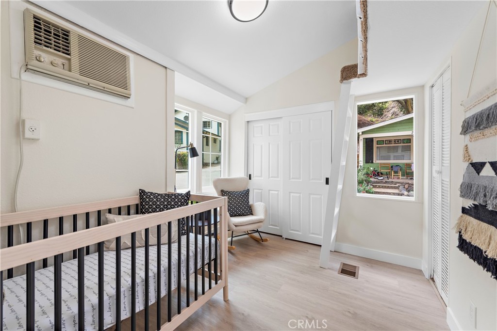 29229 Hazel Bell Drive Silverado, CA 92676 - Photo 17 of 39 a bedroom with furniture and a window