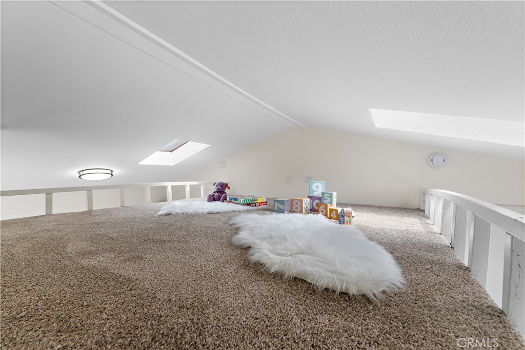 29229 Hazel Bell Drive Silverado, CA 92676 - Photo 19 of 39 a bedroom with a bed and window