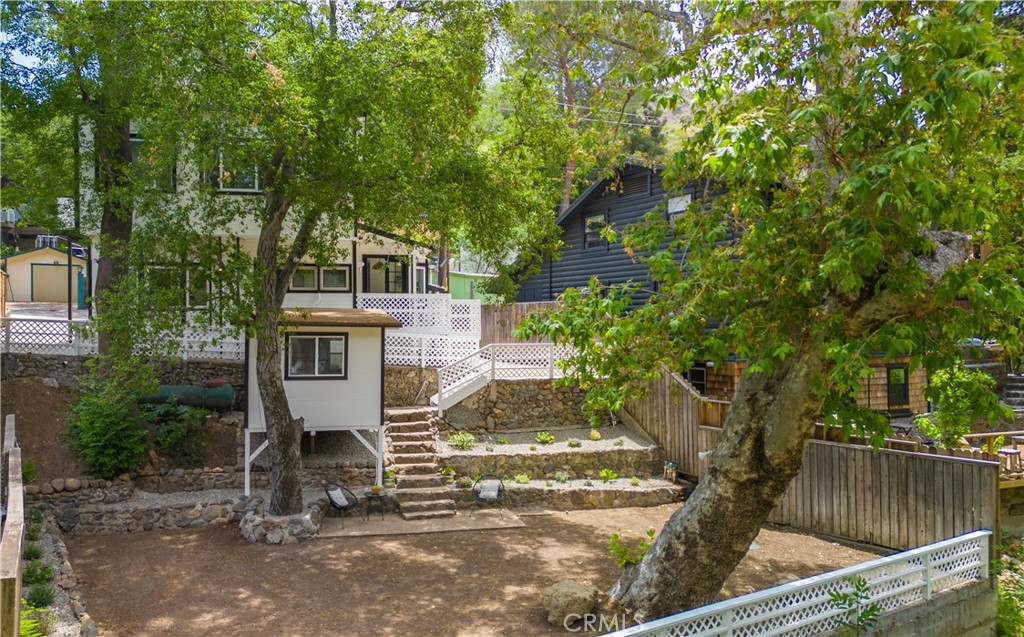 29229 Hazel Bell Drive Silverado, CA 92676 - Photo 2 of 39 a view of a house with a tree