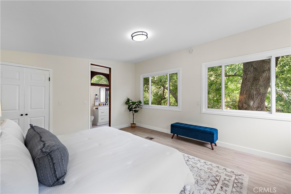 29229 Hazel Bell Drive Silverado, CA 92676 - Photo 27 of 39 a bedroom with a bed and window