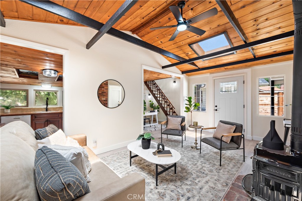29229 Hazel Bell Drive Silverado, CA 92676 - Photo 8 of 39 a living room with furniture a rug and a window