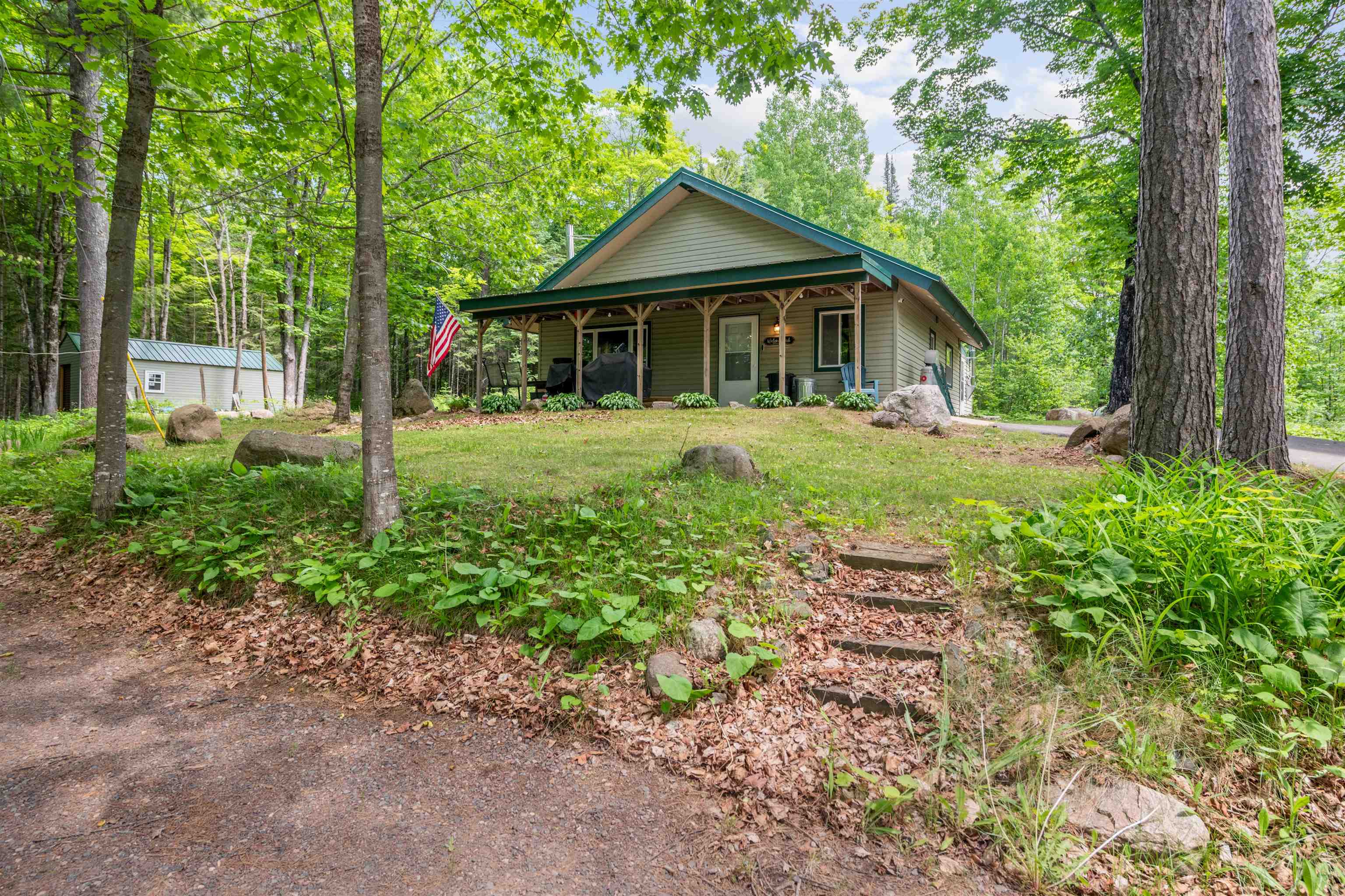 48840 Old Grade Road Cable, WI 54821 - Photo 17 of 22 View of front of property featuring a porch