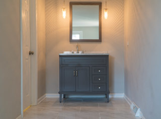 18406 Bock Road Lansing, IL 60438 - Photo 11 of 20 a bathroom with a sink and a mirror