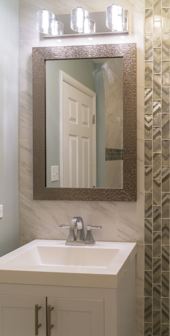 18406 Bock Road Lansing, IL 60438 - Photo 12 of 20 a bathroom with a sink and a mirror