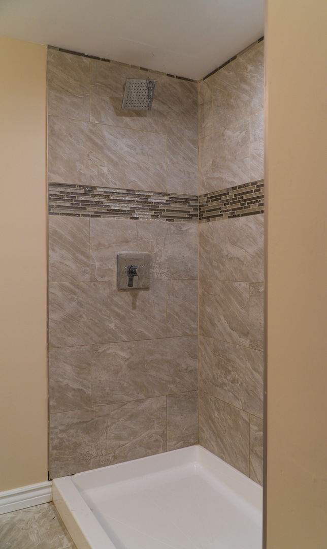 18406 Bock Road Lansing, IL 60438 - Photo 15 of 20 a bathroom with a shower