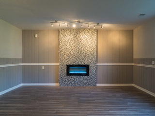 18406 Bock Road Lansing, IL 60438 - Photo 19 of 20 a view of a room with wooden floor and a fireplace