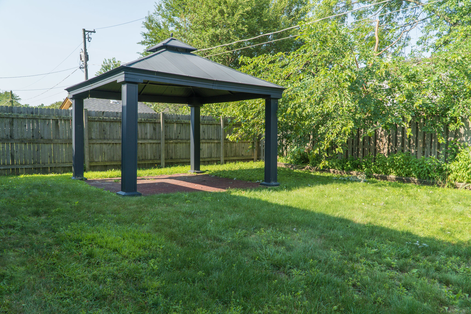 18406 Bock Road Lansing, IL 60438 - Photo 20 of 20 a view of a backyard with a small cabin