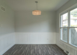 18406 Bock Road Lansing, IL 60438 - Photo 3 of 20 en empty room with wooden floor and windows